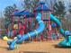 Multi-story playground equipment with covered platforms, slides, and climbers, providing a dynamic recreational space for children at 6935 Melody Ridge Rd, Buford, GA 30518