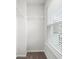 Walk-in closet with window and wire shelves at 6935 Melody Ridge Rd, Buford, GA 30518