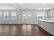 Bright dining room with hardwood floors and access to deck at 6935 Melody Dr, Buford, GA 30518