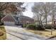 Long driveway leading to a two-car garage at 1609 Wellshire Ln, Dunwoody, GA 30338