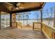 Wooden deck overlooking a tranquil lake at 350 Polk Rd, Covington, GA 30014