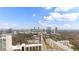 Aerial view showcasing cityscape and tree-lined streets at 3777 Peachtree Ne Rd # 713, Atlanta, GA 30319