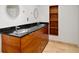 Bathroom with double vanity and built-in shelving at 3777 Peachtree Ne Rd # 713, Atlanta, GA 30319