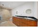Modern bathroom with double sinks and a large shower at 3777 Peachtree Ne Rd # 713, Atlanta, GA 30319