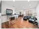 Game room with hardwood floors and vintage pinball machine at 3777 Peachtree Ne Rd # 713, Atlanta, GA 30319