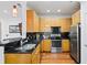 Modern kitchen with stainless steel appliances and granite countertops at 3777 Peachtree Ne Rd # 713, Atlanta, GA 30319