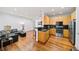 Open concept kitchen with stainless steel appliances and island at 3777 Peachtree Ne Rd # 713, Atlanta, GA 30319