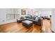 Spacious living area with hardwood floors and sectional sofa at 3777 Peachtree Ne Rd # 713, Atlanta, GA 30319