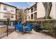 Relaxing pool area with patio furniture and grill at 3777 Peachtree Ne Rd # 713, Atlanta, GA 30319