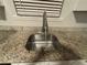 Stainless steel kitchen sink with modern faucet at 5449 Martins Crossing Rd, Stone Mountain, GA 30088