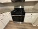 Stainless steel gas range and oven with granite countertop at 5449 Martins Crossing Rd, Stone Mountain, GA 30088