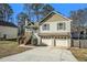 Two-story house with attached two-car garage at 1215 Mountain Springs Nw Dr, Kennesaw, GA 30144