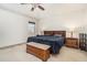 Spacious main bedroom with king-size bed and wooden furniture at 1215 Mountain Springs Nw Dr, Kennesaw, GA 30144