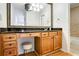 Bathroom with granite vanity and large mirror at 1468 Briarwood Ne Rd # 1307, Brookhaven, GA 30319