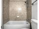 Clean bathroom with tile shower/tub combo at 1468 Briarwood Ne Rd # 1307, Brookhaven, GA 30319