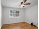 Bright bedroom with hardwood floors and ceiling fan at 1468 Briarwood Ne Rd # 1307, Brookhaven, GA 30319