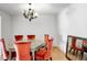 Elegant dining room, features a chandelier and mirror at 1468 Briarwood Ne Rd # 1307, Brookhaven, GA 30319