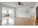 Bright living room with hardwood floors and access to sunroom at 1468 Briarwood Ne Rd # 1307, Brookhaven, GA 30319
