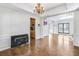 Formal dining room with hardwood floors, chandelier and built-in cabinetry at 3377 Hunters Point Se Rd, Smyrna, GA 30082