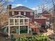 Elevated deck with a screened porch and patio at 6103 Governors Walk Dr, Canton, GA 30115
