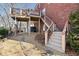 Steps leading to deck and backyard with gravel at 6103 Governors Walk Dr, Canton, GA 30115