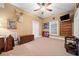Finished basement room with sports memorabilia and a TV at 6103 Governors Walk Dr, Canton, GA 30115