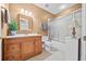 Basement bathroom with shower/tub combo and wood vanity at 6103 Governors Walk Dr, Canton, GA 30115