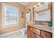 Bathroom with granite vanity and shower/tub combo at 6103 Governors Walk Dr, Canton, GA 30115