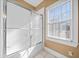 Bright bathroom with shower and window at 6103 Governors Walk Dr, Canton, GA 30115