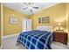 Basement bedroom with double bed and ceiling fan at 6103 Governors Walk Dr, Canton, GA 30115