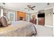 Main bedroom with large windows and TV at 6103 Governors Walk Dr, Canton, GA 30115