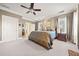 Main bedroom with fireplace and hardwood floors at 6103 Governors Walk Dr, Canton, GA 30115