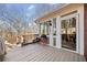 Spacious deck with glass door access and wooded views at 6103 Governors Walk Dr, Canton, GA 30115