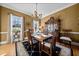 Elegant dining room features a chandelier and hardwood floors at 6103 Governors Walk Dr, Canton, GA 30115