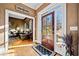 Elegant entryway with hardwood floors and view into living room at 6103 Governors Walk Dr, Canton, GA 30115
