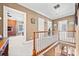 Upper hallway with hardwood floors and views to rooms at 6103 Governors Walk Dr, Canton, GA 30115