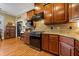 Modern kitchen with stainless steel appliances and granite countertops at 6103 Governors Walk Dr, Canton, GA 30115