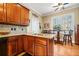 Kitchen boasts granite counters, hardwood floors and an island at 6103 Governors Walk Dr, Canton, GA 30115