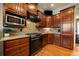 Kitchen features stainless steel appliances and granite countertops at 6103 Governors Walk Dr, Canton, GA 30115