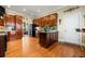 Spacious kitchen with dark wood cabinets and granite counters at 6103 Governors Walk Dr, Canton, GA 30115