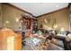 Cozy library with built-in bookshelves and wet bar at 6103 Governors Walk Dr, Canton, GA 30115