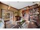 Spacious living room with hardwood floors and large windows at 6103 Governors Walk Dr, Canton, GA 30115