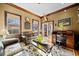 Spacious living room with hardwood floors and large windows at 6103 Governors Walk Dr, Canton, GA 30115