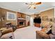 Spacious living room with fireplace and hardwood floors at 6103 Governors Walk Dr, Canton, GA 30115