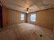 Spacious bedroom with ceiling fan and neutral carpeting at 3520 Haynes Ridge Rd, Loganville, GA 30052