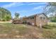 Home's exterior showcases a spacious backyard and deck at 4761 Lincoln Ne Dr, Kennesaw, GA 30144