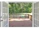 Deck and fenced backyard with mature trees at 4761 Lincoln Ne Dr, Kennesaw, GA 30144