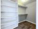 Spacious closet with shelving and hanging rods at 4761 Lincoln Ne Dr, Kennesaw, GA 30144