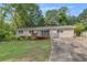 Ranch style home with a large deck and spacious yard at 4761 Lincoln Ne Dr, Kennesaw, GA 30144