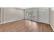 Spacious living room with hardwood floors and lots of light at 4761 Lincoln Ne Dr, Kennesaw, GA 30144